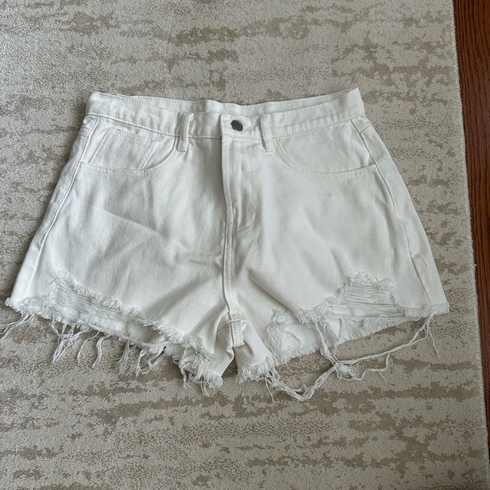 White Jean Shorts with Frayed Hem and Distressed Details